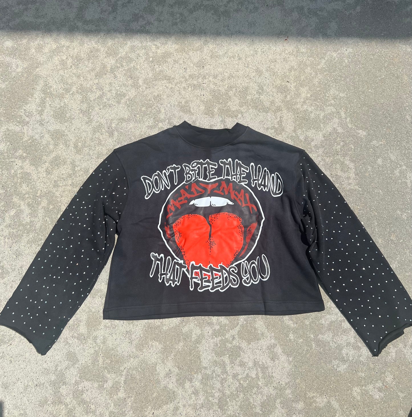 “DON’T BITE THE HAND THAT FEEDS YOU” SHIRT